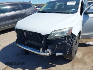 2014 Audi Q7 3.0T Premium Plus with VIN WA1LGAFEXED000843, listed as a IAAI auction lot 41728585 with 169,033 mi miles. Bid and sale history available at carsss.com. Image 6.