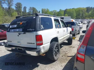2003 Chevrolet Tahoe LS with VIN 1GNEK13Z13J131945, listed as a IAAI auction lot 42036677 with Not Provided miles. Bid and sale history available at carsss.com. Image 4.
