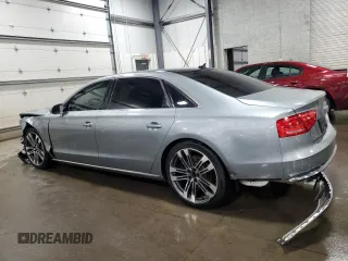 2012 Audi A8 z VIN WAURVAFD3CN025035, wystawiony jako Copart lot #52252915 z przebiegiem 71 312 mil mil oraz Szkoda całkowita • Salvage title. Historia ofert i sprzedaży dostępna na DreamBid. Obrazek 2.
