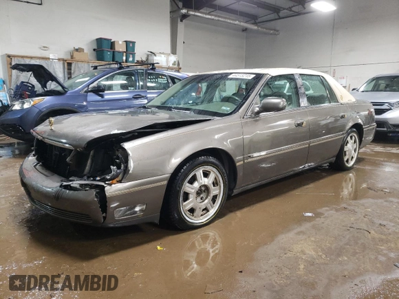 2003 Cadillac DeVille with VIN 1G6KD54Y43U124198, listed as a Copart auction lot 44515215 with 116,006 mi miles and Salvage Title. Bid and sale history available at carsss.com. Image 1.