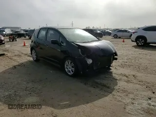 2010 Honda Fit Sport with VIN JHMGE8H44AS021590, listed as a Copart auction lot 52333635 with 137,770 mi miles and Salvage title. Bid and sale history available at DreamBid. Image 12.