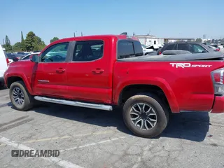 2020 Toyota Tacoma SR5 with VIN 3TMAZ5CN1LM139635, listed as a IAAI auction lot 42313763 with 72,752 mi miles and . Bid and sale history available at DreamBid. Image 14.