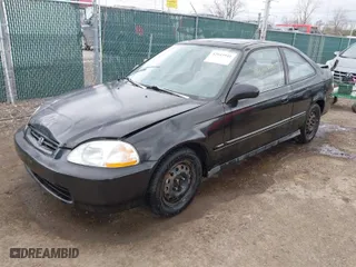 1997 Honda Civic EX with VIN 1HGEJ8242VL044722, listed as a IAAI auction lot 42045941 with 266,481 mi miles. Bid and sale history available at carsss.com. Image 2.