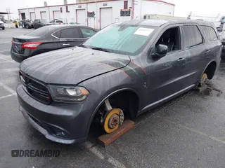 2016 Dodge Durango R/T with VIN 1C4SDHCT4GC483390, listed as a IAAI auction lot 41527579 with 49,871 mi miles and . Bid and sale history available at DreamBid. Image 2.