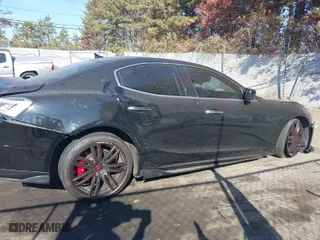 2014 Maserati Ghibli S Q4 with VIN ZAM57RTA9E1106695, listed as a IAAI auction lot 40783416 with 92,885 mi miles. Bid and sale history available at carsss.com. Image 13.
