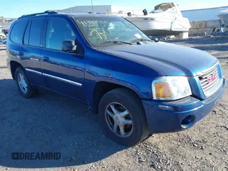 2006 GMC Envoy SLT with VIN 1GKDT13S762170322, listed as a IAAI auction lot 41324540 with 999,999 mi miles. Bid and sale history available at carsss.com. Image 1.