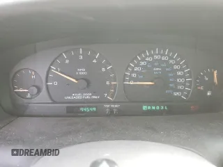 2000 Chrysler Voyager SE z VIN 1C4GJ44G5YB803736, wystawiony jako Copart lot #69868004 z przebiegiem 94 549 mil mil oraz Czysty tytuł • Clean title. Historia ofert i sprzedaży dostępna na DreamBid. Obrazek 9.