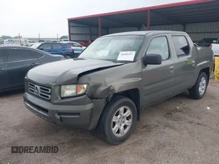 2007 Honda Ridgeline RTL with VIN 2HJYK16517H513832, listed as a IAAI auction lot 42626411 with 209,171 mi miles and . Bid and sale history available at DreamBid. Image 17.
