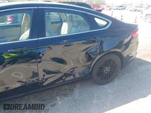 2014 Ford Fusion SE with VIN 3FA6P0HD4ER291323, listed as a IAAI auction lot 41952990 with 148,583 mi miles. Bid and sale history available at carsss.com. Image 6.
