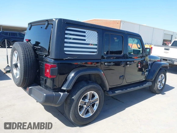 2023 Jeep Wrangler Sahara with VIN 1C4HJXEN5PW508257, listed as a IAAI auction lot 42007569 with 34,990 mi miles and . Bid and sale history available at DreamBid. Image 4.