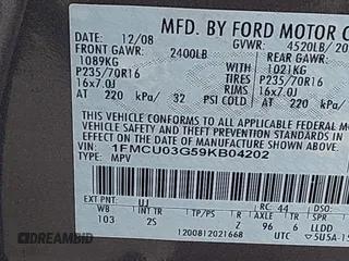 2009 Ford Escape XLT with VIN 1FMCU03G59KB04202, listed as a IAAI auction lot 41919819 with 111,730 mi miles. Bid and sale history available at carsss.com. Image 9.