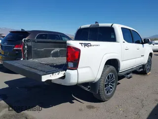 2021 Toyota Tacoma SR with VIN 3TYAX5GN5MT014868, listed as a IAAI auction lot 41549927 with 30,653 mi miles and . Bid and sale history available at DreamBid. Image 4.