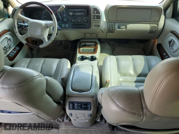 2000 Cadillac Escalade z VIN 1GYEK63R2YR210601, wystawiony jako Copart lot #64108944 z przebiegiem 186 964 mil mil oraz Szkoda całkowita • Salvage title. Historia ofert i sprzedaży dostępna na DreamBid. Obrazek 8.
