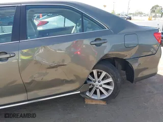 2012 Toyota Camry Hybrid XLE with VIN 4T1BD1FK0CU020723, listed as a IAAI auction lot 42031093 with 121,297 mi miles. Bid and sale history available at carsss.com. Image 6.