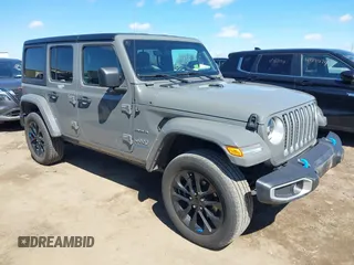 2023 Jeep Wrangler Sahara with VIN 1C4JJXP62PW696002, listed as a IAAI auction lot 41891127 with 44,567 mi miles and . Bid and sale history available at DreamBid. Image 1.