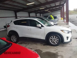 2014 Mazda CX-5 Touring with VIN JM3KE4CY9E0370610, listed as a IAAI auction lot 42016896 with 72,340 mi miles. Bid and sale history available at carsss.com. Image 12.