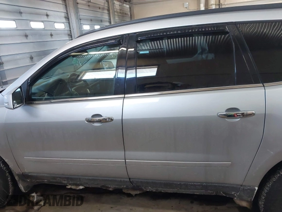 2015 Chevrolet Traverse LT with VIN 1GNKVHKD3FJ126405, listed as a IAAI auction lot 41597600 with 188,558 mi miles and . Bid and sale history available at DreamBid. Image 14.