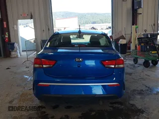 2021 Kia Rio S with VIN 3KPA24AD7ME364789, listed as a IAAI auction lot 42044676 with 54,072 mi miles and . Bid and sale history available at DreamBid. Image 16.