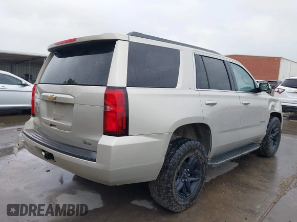 2015 Chevrolet Tahoe LT with VIN 1GNSKBKC3FR192693, listed as a IAAI auction lot 42142810 with Not provided miles and . Bid and sale history available at DreamBid. Image 4.