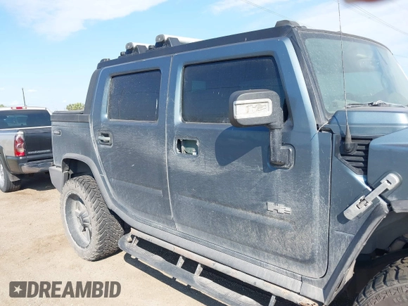 2006 Hummer H2 with VIN 5GRGN22U06H103326, listed as a IAAI auction lot 41474829 with 217,436 mi miles. Bid and sale history available at carsss.com. Image 6.