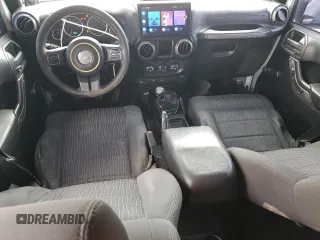 2012 Jeep Wrangler Unlimited Sport z VIN 1C4BJWDG8CL220960, wystawiony jako Copart lot #57823315 z przebiegiem 177 541 mil mil oraz Szkoda całkowita • Salvage title. Historia ofert i sprzedaży dostępna na DreamBid. Obrazek 8.