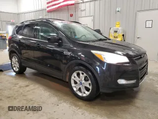 2013 Ford Escape SE with VIN 1FMCU9GX8DUA42743, listed as a Copart auction lot 50427395 with 169,033 mi miles and Clean Title. Bid and sale history available at DreamBid. Image 4.