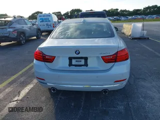 2014 BMW 4 Series 435i with VIN WBA3R1C51EK192795, listed as a IAAI auction lot 41263037 with 22,937 mi miles and . Bid and sale history available at DreamBid. Image 16.
