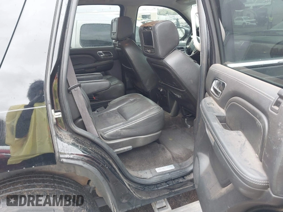 2014 Cadillac Escalade Platinum z VIN 1GYS4DEF9ER212880, wystawiony jako IAAI lot #41954880 z przebiegiem 193 203 mil mil oraz . Historia ofert i sprzedaży dostępna na DreamBid. Obrazek 8.