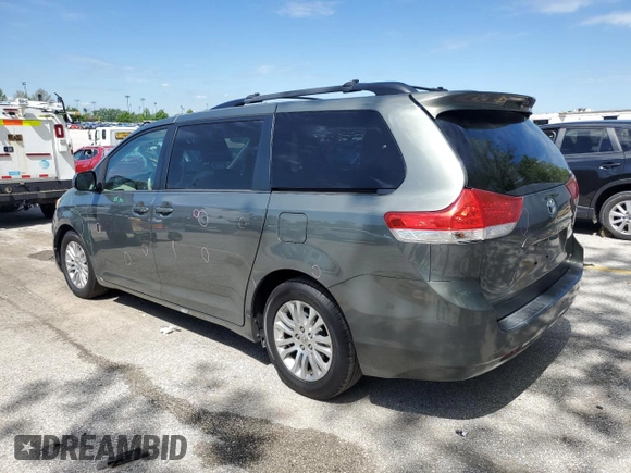 2014 Toyota Sienna XLE with VIN 5TDYK3DC1ES453924, listed as a Copart auction lot 56148565 with 198,185 mi miles and Clean title. Bid and sale history available at DreamBid. Image 2.