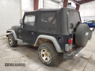 1997 Jeep Wrangler Sport with VIN 1J4FY19S8VP471139, listed as a Copart auction lot 60664255 with 126,710 mi miles and Clean title. Bid and sale history available at DreamBid. Image 2.