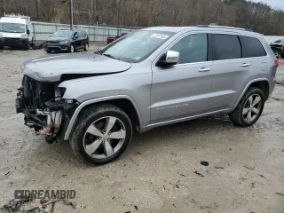 2015 Jeep Grand Cherokee Overland z VIN 1C4RJFCT0FC197224, wystawiony jako Copart lot #42397805 z przebiegiem 99 634 mil mil oraz Szkoda całkowita • Salvage title. Historia ofert i sprzedaży dostępna na DreamBid. Obrazek 1.