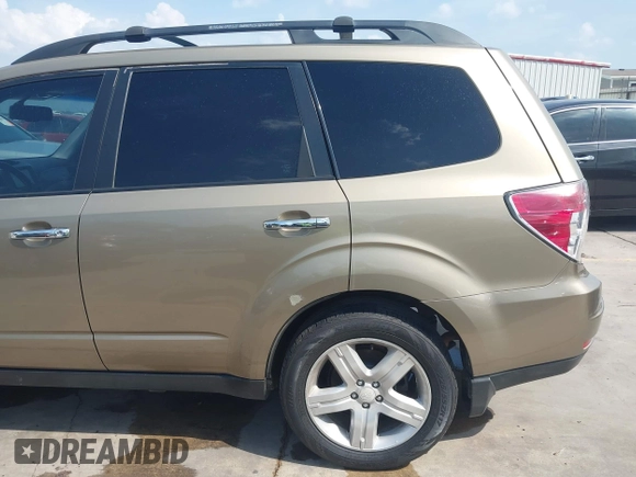 2009 Subaru Forester X Limited z VIN JF2SH64699H745428, wystawiony jako IAAI lot #42407890 z przebiegiem 131 716 mil mil oraz . Historia ofert i sprzedaży dostępna na DreamBid. Obrazek 19.