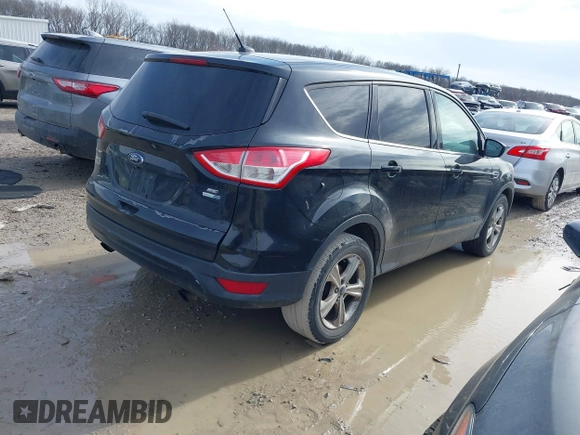 2015 Ford Escape SE with VIN 1FMCU9GX8FUB65137, listed as a IAAI auction lot 41657516 with 145,944 mi miles. Bid and sale history available at carsss.com. Image 4.