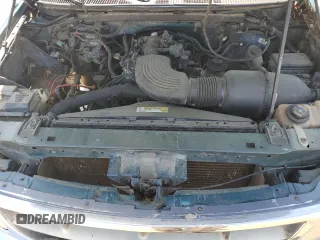 1998 Ford F-150 z VIN 1FTZX1768WNB23317, wystawiony jako Copart lot #52336895 z przebiegiem 288 431 mil mil oraz Szkoda całkowita • Salvage title. Historia ofert i sprzedaży dostępna na DreamBid. Obrazek 11.