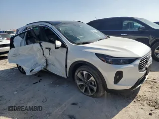 2024 Ford Escape Platinum with VIN 1FMCU9JAXRUA33229, listed as a Copart auction lot 44464685 with 5,431 mi miles and Salvage Title. Bid and sale history available at DreamBid. Image 4.