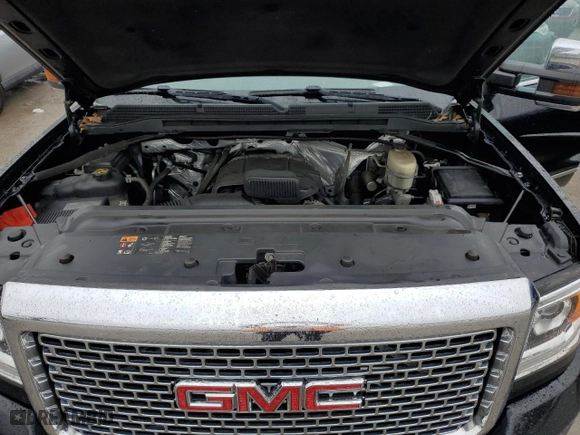 2015 GMC Sierra 2500HD Denali with VIN 1GT120EG1FF668772, listed as a Copart auction lot 84406604 with 113,260 mi miles and Salvage Title. Bid and sale history available at carsss.com. Image 11.