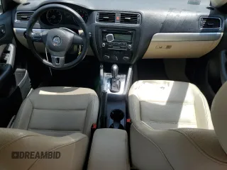 2013 Volkswagen Jetta SE with VIN 3VWDP7AJ5DM433357, listed as a Copart auction lot 61977205 with 64,384 mi miles and Salvage title. Bid and sale history available at DreamBid. Image 8.