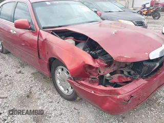 1999 Lincoln Town Car Signature z VIN 1LNFM82WXXY601583, wystawiony jako IAAI lot #42193270 z przebiegiem Nie podano mil oraz . Historia ofert i sprzedaży dostępna na DreamBid. Obrazek 17.
