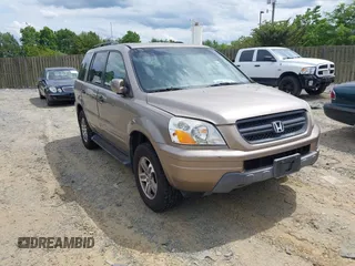 2004 Honda Pilot EX with VIN 2HKYF18434H575250, listed as a IAAI auction lot 42219882 with 196,515 mi miles and . Bid and sale history available at carsss.com. Image 1.