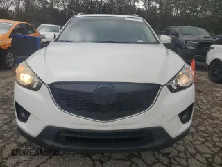 2015 Mazda CX-5 Grand Touring with VIN JM3KE2DY6F0504784, listed as a Copart auction lot 47671705 with 174,682 mi miles and Salvage Title. Bid and sale history available at carsss.com. Image 5.