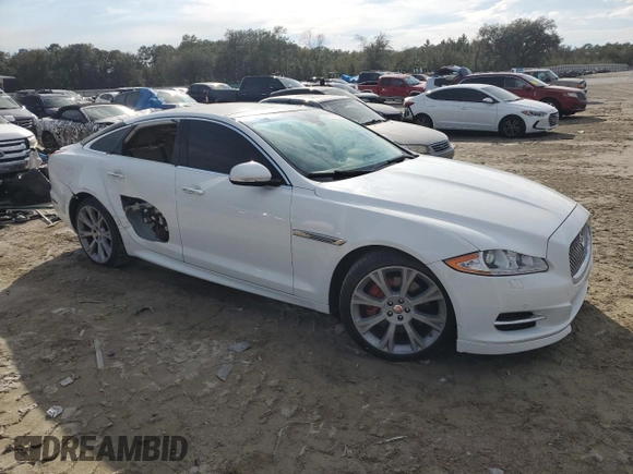 2015 Jaguar XJ with VIN SAJWA1CZ9F8V88418, listed as a Copart auction lot 45547965 with 82,423 mi miles and Salvage Title. Bid and sale history available at carsss.com. Image 4.