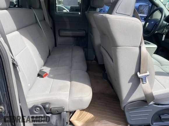 2005 Ford F-150 STX with VIN 1FTRX14W15NB53391, listed as a Copart auction lot 50452905 with 169,403 mi miles and Salvage Title. Bid and sale history available at carsss.com. Image 6.
