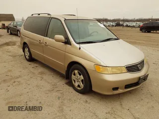 2000 Honda Odyssey EX z VIN 2HKRL1868YH595787, wystawiony jako IAAI lot #41823390 z przebiegiem 243 111 mil mil oraz . Historia ofert i sprzedaży dostępna na DreamBid. Obrazek 1.