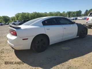 2014 Dodge Charger SE with VIN 2C3CDXBG5EH129699, listed as a Copart auction lot 53152845 with 173,216 mi miles and Salvage Title. Bid and sale history available at DreamBid. Image 3.