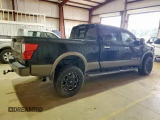 2016 Nissan Titan Pro-4X with VIN 1N6BA1F44GN509606, listed as a Copart auction lot 62336625 with 258,040 mi miles and Salvage title. Bid and sale history available at DreamBid. Image 3.