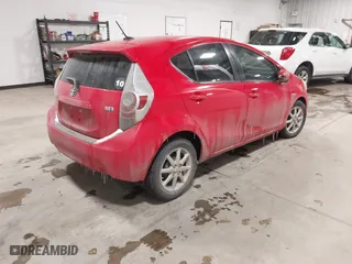 2013 Toyota Prius c One with VIN JTDKDTB32D1038030, listed as a IAAI auction lot 41568174 with 1 mi miles. Bid and sale history available at carsss.com. Image 4.