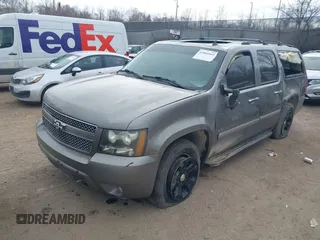2007 Chevrolet Suburban LT with VIN 1GNFC16057R413155, listed as a IAAI auction lot 41884665 with 205,038 mi miles. Bid and sale history available at carsss.com. Image 17.