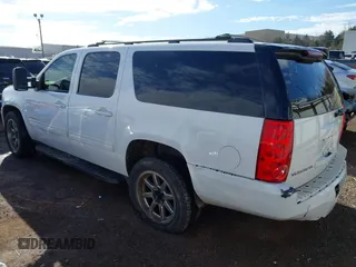 2014 GMC Yukon XL SLT with VIN 1GKS1KE00ER125405, listed as a IAAI auction lot 41609280 with 221,690 mi miles. Bid and sale history available at carsss.com. Image 3.