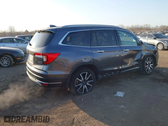2019 Honda Pilot Touring 7-Passenger with VIN 5FNYF6H69KB050235, listed as a IAAI auction lot 41782057 with 85,907 mi miles. Bid and sale history available at carsss.com. Image 4.