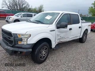 2016 Ford F-150 XLT with VIN 1FTEW1E84GKE18228, listed as a IAAI auction lot 41883297 with 147,018 mi miles. Bid and sale history available at carsss.com. Image 17.